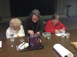 Pastor Judy teaching how to make prayer beads