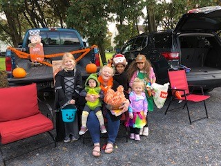 Woman and 5 children at Trunk or Treat